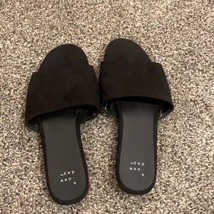 Black strapped slide on sandals